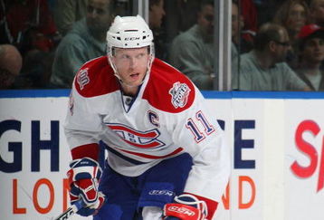 UNIONDALE, NY - APRIL 02:  Saku Koivu #11 of the Montreal Canadiens skates against the New York Islanders on April 2, 2009 at the Nassau Coliseum in Uniondale, New York.  (Photo by Bruce Bennett/Getty Images)