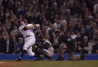 1 Nov 2001: Scott Brosius #18 of the New York Yankees hits a two run home run against the Arizona Diamondbacks to tie the game in the ninth inning during game 5 of the World Series at Yankee Stadium in New York, New York. Yankees win 3-2 over the Diamondbacks. DIGITAL IMAGE Mandatory Credit: Ezra Shaw/ALLSPORT