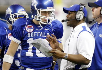 DETROIT - DECEMBER 05: Head coach Turner Gill of the Buffalo Bulls talks with Drew Willy #16 while playing the Ball State Cardinals in the MAC Championship game on December 5, 2008 at Ford Field in Detroit, Michigan. (Photo by Gregory Shamus/Getty Images)