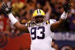 NEW ORLEANS - JANUARY 07:  Tyson Jackson #93 of the Louisiana State University Tigers celebrates during the AllState BCS National Championship against the Ohio State Buckeyes on January 7, 2008 at the Louisiana Superdome in New Orleans, Louisiana.  (Photo by Doug Benc/Getty Images)