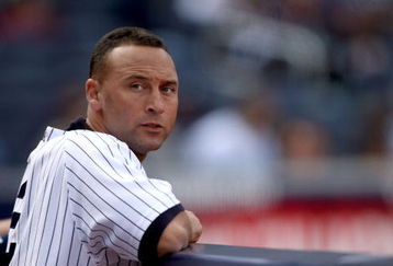 NEW YORK - APRIL 19:  Derek Jeter #2 of the New York Yankees stands in the dugout during their game against the Cleveland Indians at Yankee Stadium on April 19, 2009 in the Bronx borough of New York City.  (Photo by Ezra Shaw/Getty Images)