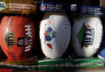 TAMPA, FL - JANUARY 30:  Footballs with Super Bowl XLIII logos sit in a window at a store on January 30, 2009 in Tampa, Florida. NFL Fans from across the country are descending on Tampa ahead of Super Bowl XLIII between the Arizona Cardinals and the Pittsburgh Steelers.  (Photo by Streeter Lecka/Getty Images)