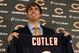LAKE FOREST, IL - APRIL 3: Quarterback Jay Cutler of the Chicago Bears holds up his #6 jersey after he was introduced as their new quarterback during a press conference on April 3, 2009 at Halas Hall in Lake Forest, Illinois. (Photo by Jim Prisching/Getty Images)