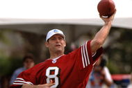 Steve Young releases a pass during an alumni air it out flag football game February 10 before  the 2006 Pro Bowl in Honolulu.  (Photo by Al Messerschmidt/Getty Images)