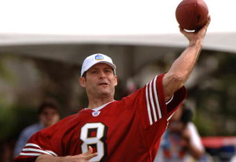 Steve Young releases a pass during an alumni air it out flag football game February 10 before  the 2006 Pro Bowl in Honolulu.  (Photo by Al Messerschmidt/Getty Images)