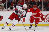 DETROIT - APRIL 18: Rick Nash #61 of the Columbus Blue Jackets tries to get around Brian Rafalski #28 of the Detroit Red Wings during Game Two of the Western Conference Quarterfinals of the 2009 NHL Stanley Cup Playoffs on April 18, 2009 at Joe Louis Arena in Detroit, Michigan.  (Photo by Gregory Shamus/Getty Images)