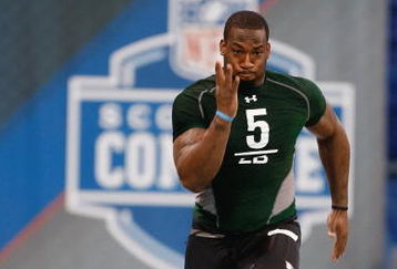 INDIANAPOLIS, IN - FEBRUARY 23:  Linebacker Aaron Curry of Wake Forset runs the 40 yard dash during the NFL Scouting Combine presented by Under Armour at Lucas Oil Stadium on February 23, 2009 in Indianapolis, Indiana. (Photo by Scott Boehm/Getty Images)