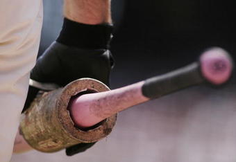 SAN FRANCISCO - MAY 14:  A San Francisco Giants player holds one of the pink Louisville Slugger bats that were distributed as part of MLB's 'Go to Bat Against Breast Cancer' promotion during the game against the Los Angeles Dodgers at AT&T Park May 14, 2006 in San Francisco, California.  (Photo by Jonathan Ferrey/Getty Images)