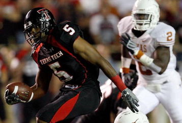 LUBBOCK, TX - NOVEMBER 01:  Michael Crabtree #5 of the Texas Tech Red Raiders carries the ball after making a reception during the first half of the game against the Texas Longhorns on November 1, 2008 at Jones Stadium in Lubbock, Texas.  (Photo by Jamie Squire/Getty Images)