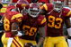 LOS ANGELES, CA - SEPTEMBER 13: (C) Rey Maualuga #58 of the USC Trojans celebrates with teammates Josh Pinkard #36 and Everson Griffen #93 after Maualuga scored on a 48-yard interception return against the Ohio State Buckeyes during the college football game at the Los Angeles Memorial Coliseum on September 13, 2008 in Los Angeles, California. (Photo by Stephen Dunn/Getty Images)