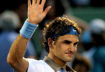 KEY BISCAYNE, FL - MARCH 31:  Roger Federer of Switzerland waves to the crowd after defeating against Taylor Dent during day nine of the Sony Ericsson Open at the Crandon Park Tennis Center on March 31, 2009 in Key Biscayne, Florida.  (Photo by Matthew Stockman/Getty Images)