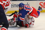 NEW YORK - APRIL 20:  Sean Avery #16 of the New York Rangers flies over John Erskine #4 of the Washington Capitals during Game Three of the Eastern Conference Quarterfinal Round of the 2009 NHL Stanley Cup Playoffs at Madison Square Garden on April 20, 2009 in New York City.  (Photo by Bruce Bennett/Getty Images)