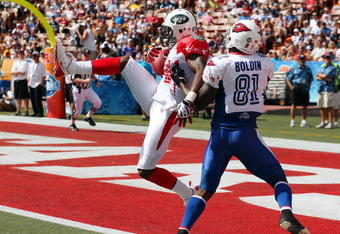 HONOLULU, HI - FEBRUARY 08: Cornerback Darrelle Revis #24 of the AFC All-Stars New York Jets intercepts an end zone pass intended for wide receiver Anquan Boldin #81 of the NFC All-Stars Arizona Cardinals in the 2009 NFL Pro Bowl at Aloha Stadium on February 8, 2009 in Honolulu, Hawaii. The NFC defeated the AFC 30-21. (Photo by Paul Spinelli/Getty Images)