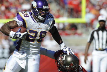TAMPA, FL - NOVEMBER 16: Running back Adrian Peterson #28 of the Minnesota Vikings rushes upfield against the Tampa Bay Buccaneers at Raymond James Stadium on November 16, 2008 in Tampa, Florida.  (Photo by Al Messerschmidt/Getty Images) 