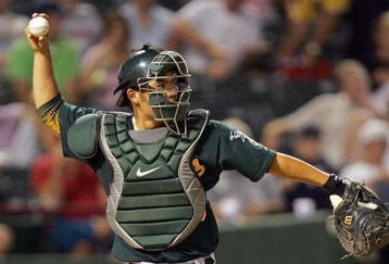 ARLINGTON, TX - AUGUST 6: Catcher Kurt Suzuki #28 of the Oakland Athletics looks to throw the ball against the Texas Rangers at Rangers Ballpark on August 6, 2007 in Arlington, Texas. (Photo by Ronald Martinez/Getty Images) 