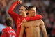 MANCHESTER, ENGLAND - APRIL 25:  Cristiano Ronaldo (R) of Manchester United is congratulated by team mate Dimitar Berbatov after scoring his team's third goal during the Barclays Premier League match between Manchester United and Tottenham Hotspur at Old Trafford on April 25, 2009 in Manchester, England.  (Photo by Shaun Botterill/Getty Images)