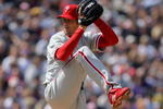 DENVER - APRIL 10:  Starting pitcher Cole Hamels #35 of the Philadelphia Phillies delivers against the Colorado Rockies during MLB action on Opening Day at Coors Field on April 10, 2009 in Denver, Colorado. Hamels collected the loss as the Rockies defeated the Phillies 10-3.  (Photo by Doug Pensinger/Getty Images)