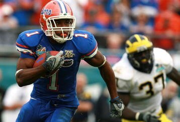 ORLANDO, FL - JANUARY 01:  Wide receiver Percy Harvin #1 of the Florida Gators gets past linebacker Chris Graham #37 of the Michigan Wolverines in the Capital One Bowl at Florida Citrus Bowl on January 1, 2008 in Orlando, Florida.  (Photo by Doug Benc/Getty Images)