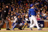 CHICAGO - OCTOBER 02:  Jim Edmonds #15 of the Chicago Cubs hits a RBI double in the bottom of the seventh inning against the Los Angeles Dodgers in Game Two of the NLDS during the 2008 MLB Playoffs at Wrigley Field on October 2, 2008 in Chicago, Illinois.  The Dodgers won 10-3.  (Photo by Jamie Squire/Getty Images)