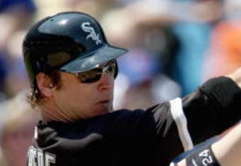 CHICAGO - JUNE 20:  Joe Crede #24 of the Chicago White Sox swings at a pitch during the game against the Chicago Cubs on June 20, 2008 at Wrigley Field in Chicago, Illinois. The Cubs defeated the White Sox 4-3. (Photo by Jonathan Daniel/Getty Images) 