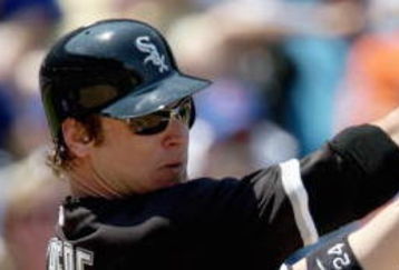 CHICAGO - JUNE 20:  Joe Crede #24 of the Chicago White Sox swings at a pitch during the game against the Chicago Cubs on June 20, 2008 at Wrigley Field in Chicago, Illinois. The Cubs defeated the White Sox 4-3. (Photo by Jonathan Daniel/Getty Images) 