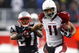 FOXBORO, MA - DECEMBER 21: Ellis Hobbs #27 of the New England Patriots is unable to stop Larry Fitzgerald #11 of the Arizona Cardinals, who scored a touchdown on the run, at Gillette Stadium on December 21, 2008 in Foxboro, Massachusetts. The Patriots won 47-7. (Photo by Jim Rogash/Getty Images)