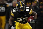 IOWA CITY, IOWA - NOVEMBER 8: Shonn Greene #23 of the Iowa Hawkeyes rushes for yards in the third quarter of play against the Penn State Nittany Lions at Kinnick Stadium on November 8, 2008 in Iowa City, Iowa. Iowa defeated Penn State  24-23. (Photo by David Purdy/Getty Images)