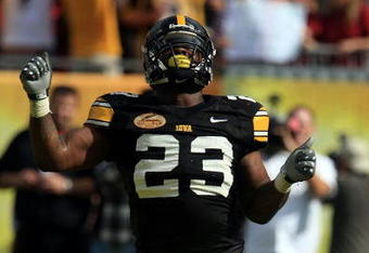 TAMPA, FL - JANUARY 01:  Shonn Green #23 of the Iowa Hawkeyes celebrates a touchdown run against the South Carolina Gamecocks during the Outback Bowl on January 1, 2009 at Raymond James Stadium in Tampa, Florida.  (Photo by Scott Halleran/Getty Images)