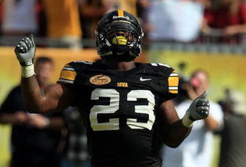 TAMPA, FL - JANUARY 01:  Shonn Green #23 of the Iowa Hawkeyes celebrates a touchdown run against the South Carolina Gamecocks during the Outback Bowl on January 1, 2009 at Raymond James Stadium in Tampa, Florida.  (Photo by Scott Halleran/Getty Images)