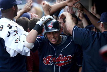 NEW YORK - APRIL 18: Asdrubal Cabrera #13 of the Cleveland Indians is congratulated in the dugout after hitting a second inning grand slam home run against the New York Yankees at Yankee Stadium on April 18, 2009 in the Bronx borough of New York City. (Photo by Nick Laham/Getty Images)