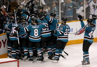SAN JOSE, CA - APRIL 25:  The San Jose Sharks celebrate after scoring the game winning goal in overtime against the Anaheim Ducks during Game Five of the Western Conference Quarterfinal Round of the 2009 NHL Stanley Cup Playoffs at HP Pavilion on April 25, 2009 in San Jose, California. The Sharks won 3-2 in overtime.  (Photo by Stephen Dunn/Getty Images)