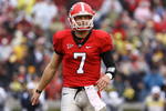 ATHENS, GA - NOVEMBER 29:  Quarterback Matthew Stafford #7 of the Georgia Bulldogs threw for 407 yards and 5 touchdowns during the game against the Georgia Tech Yellow Jackets during the game at Sanford Stadium on November 29, 2008 in Athens, Georgia.  The Yellow Jackets beat Bulldogs 45-42.  (Photo by Mike Zarrilli/Getty Images)