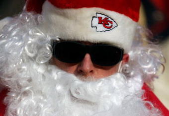 KANSAS CITY, MO - DECEMBER 21:  Santa Claus watches from the front row during the game between the Miami Dolphins and the Kansas City Chiefs on December 21, 2008 at Arrowhead Stadium in Kansas City, Missouri.  (Photo by Jamie Squire/Getty Images)
