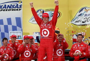 KANSAS CITY, KS - APRIL 26:  Scott Dixon driver of the #9 Target Chip Ganassi Racing Dallara Honda celebrates his victory during for the IRL IndyCar Series Road Runner Turbo Indy 300 on April 26, 2009 at Kansas Speedway in Kansas City, Kansas.  (Photo by Jonathan Ferrey/Getty Images)