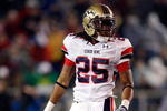 MOBILE, AL - JANUARY 24:  Louis Delmas #25 of North Team looks on against the South Team during the Under Armour Senior Bowl on January 24, 2009 at Ladd-Peebles Stadium in Mobile, Alabama.  (Photo by Chris Graythen/Getty Images for Under Armour)