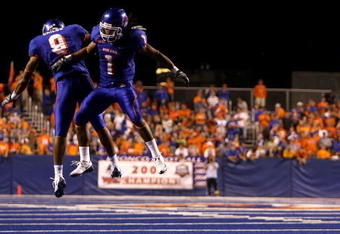 BOISE , ID - SEPTEMBER 13: Kyle Wilson #1 of the Boise State Broncos celebrates with teammate Jeremy Childs #9 after making an interception against the Bowling Green Falcons at Bronco Stadium on September 13, 2008 in Boise, Idaho. (Photo by Jonathan Ferrey/Getty Images)