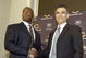 LIBERTYVILLE, IL - JANUARY 15:  Chicago Bears General Manager Jerry Angelo (R) congratulates former defensive coordinator for the St. Louis Rams, Lovie Smith (L), on his four year contract as head coach of the Chicago Bears at a media conference on January 15, 2004 in Libertyville, Illinois.  (Photo by Aynsley Floyd/Getty Images)