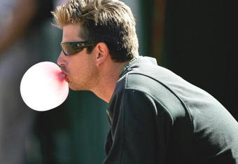 OAKLAND, CA - SEPTEMBER 02: Pitcher Kirk Saarloos #31 of the Oakland Athletics blows a bubble against the Baltimore Orioles at McAfee Coliseum on September 2, 2006 in Oakland, California.  (Photo by Jed Jacobsohn/Getty Images)