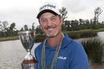 AVONDALE, LA - APRIL 26:  Jerry Kelly poses with the trophy after his win during the final round of the Zurich Classic at TPC Louisiana on April 26, 2009  in Avondale, Louisiana. (Photo by Dave Martin/Getty Images)