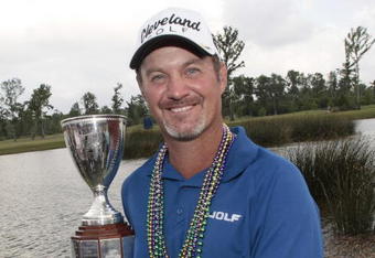 AVONDALE, LA - APRIL 26:  Jerry Kelly poses with the trophy after his win during the final round of the Zurich Classic at TPC Louisiana on April 26, 2009  in Avondale, Louisiana. (Photo by Dave Martin/Getty Images)