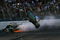 TALLADEGA, AL - APRIL 26:  Carl Edwards, driver of the #99 Claritin Ford goes airborne as Ryan Newman, driver of the #34 Stewart-Haas Racing Chevrolet hits the wall at the end of the NASCAR Sprint Cup Series Aaron's 499 at Talladega Superspeedway on April 26, 2009 in Talladega, Alabama.  (Photo by Todd Warshaw/Getty Images)