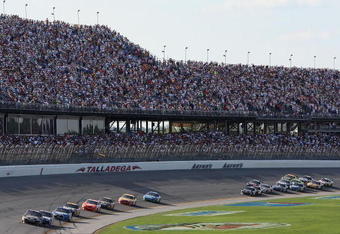 TALLADEGA, AL - APRIL 26:  Ryan Newman, driver of the #39 Stewart Haas Racing Chevrolet, leads a group of cars during the NASCAR Sprint Cup Series Aaron's 499 at Talladega Superspeedway on April 26, 2009 in Talladega, Alabama. (Photo by Christian Petersen/Getty Images)