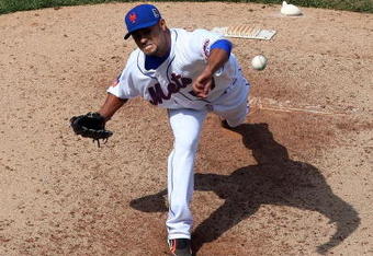 NEW YORK - APRIL 18:  Johan Santana #57 of the New York Mets pitches against the Milwaukee Brewers on April 18, 2009 at Citi Field in the Flushing neighborhood of the Queens borough of New York City. The Mets won the game 1-0.  (Photo by Jim McIsaac/Getty Images)