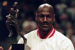 12 Jun 1998:  Michael Jordan #23 of the Chicago Bulls holds up the MVP trophy before the Eastern Conference game against the Indiana Pacers at the United Center in Chicago, Illinois. The Bulls defeated the Pacers 104-98. .  Mandatory Credit: Jonathan Daniel  /Allsport