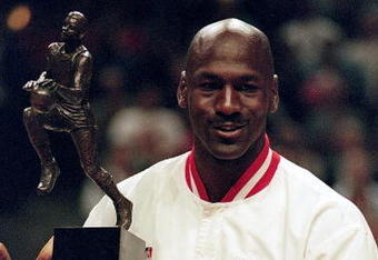 12 Jun 1998:  Michael Jordan #23 of the Chicago Bulls holds up the MVP trophy before the Eastern Conference game against the Indiana Pacers at the United Center in Chicago, Illinois. The Bulls defeated the Pacers 104-98. .  Mandatory Credit: Jonathan Daniel  /Allsport