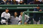 BOSTON - APRIL 26: Johnny Damon #18, Jorge Posada #20 and Derek Jeter #2 of the New York Yankees watch the final moments of a 4-1 loss to the Boston Red Sox at Fenway Park April 26, 2009 in Boston, Massachusetts. (Photo by Jim Rogash/Getty Images)