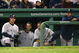 BOSTON - APRIL 26: Johnny Damon #18, Jorge Posada #20 and Derek Jeter #2 of the New York Yankees watch the final moments of a 4-1 loss to the Boston Red Sox at Fenway Park April 26, 2009 in Boston, Massachusetts. (Photo by Jim Rogash/Getty Images)