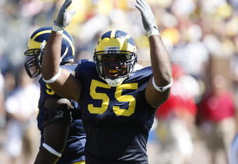 ANN ARBOR, MI - SEPTEMBER 6:  Defensive end Brandon Graham #55 of the Michigan Wolverines raises his arms during the game against the Miami of Ohio Red Hawks on September 6, 2008 at Michigan Stadium in Ann Arbor, Michigan.  The Wolverines defeated the Red Hawks 16-6. (Photo by Gregory Shamus/Getty Images)