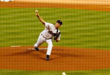 HOUSTON - APRIL 06:  Pitcher Roy Oswalt #44 of the Houston Astros throws the first pitch to Alfonso Soriano #12 of the Chicago Cubs on Opening Day on April 6, 2009 at Minute Maid Park in Houston, Texas.  (Photo by Chris Graythen/Getty Images)