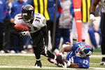 EAST RUTHERFORD, NJ - NOVEMBER 16:  Fabian Washington #31 of the Baltimore Ravens intercepts the ball as Plaxico Burress #17 of The New York Giants misses the tackle during their game on November 16, 2008 at Giants Stadium in East Rutherford, New Jersey.  (Photo by Al Bello/Getty Images)